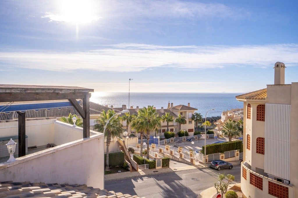 TOP FLOOR BUNGALOW WITH LARGE SOLARIUM AND SEA VIEWS 100M FROM THE BEACH IN CABO ROIG photo 1