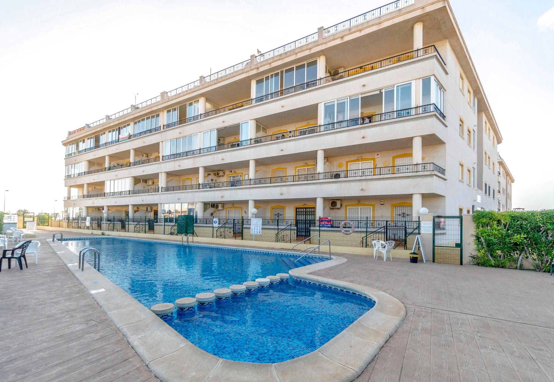 COZY APARTMENT WITH SEA VIEWS AT PLAYA FLAMENCA - COMMUNAL POOL AND PARKING IN THE BASEMENT - A CAR IS INCLUDED WITH THE APARTMENT. image 2