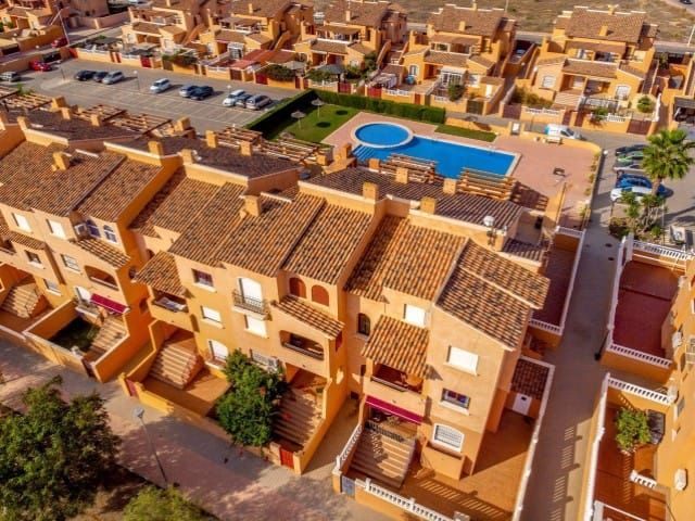 This cosy bungalow is located in the popular urbanization Altos del Sol, in Aguas Nuevas. image 2